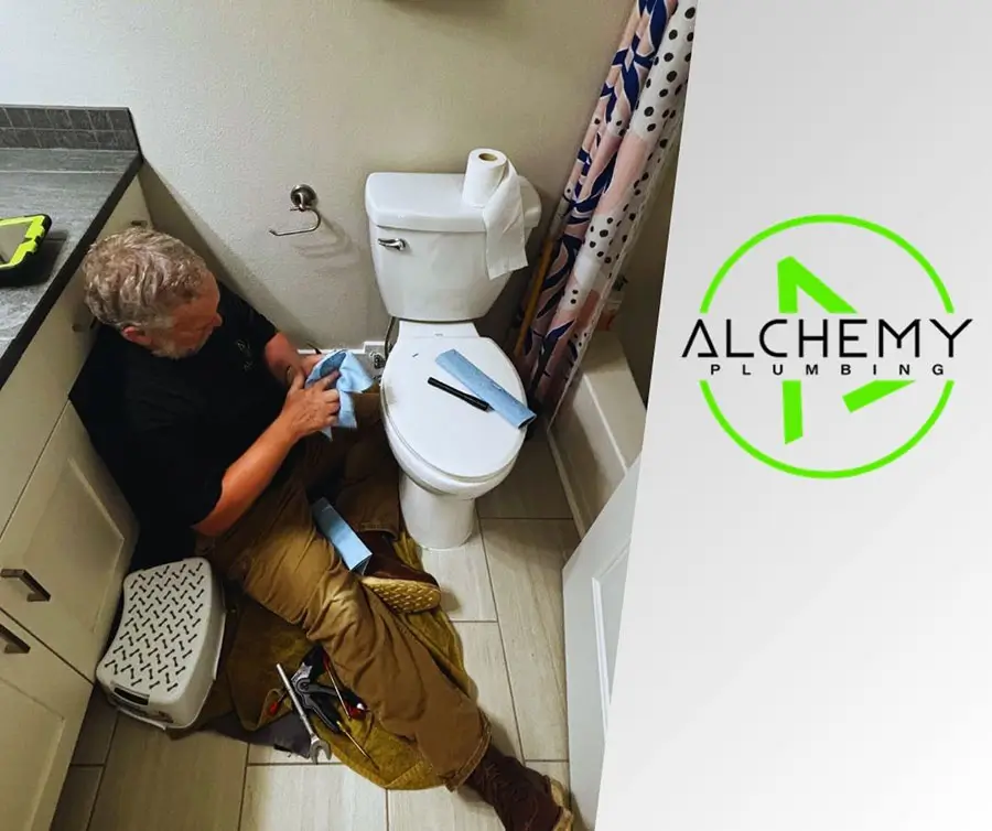 Alchemy Plumbing plumber performing professional repair